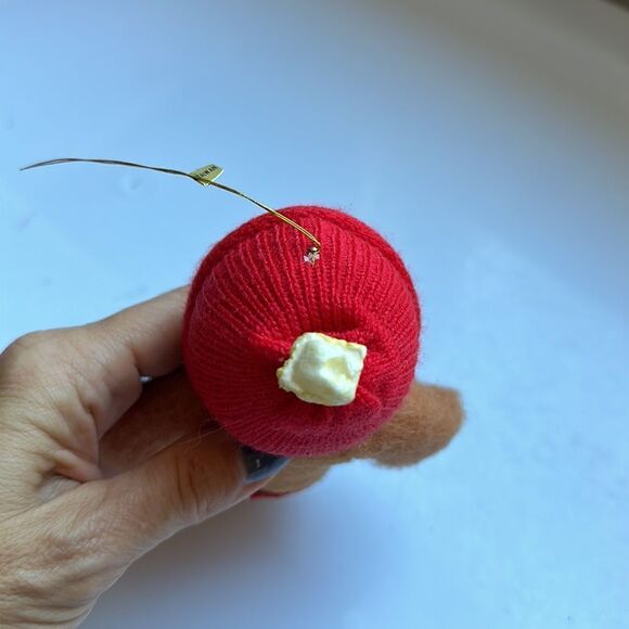 Vintage bendable smiling fuzzy gingerbread man ornament with red cap - Picture 5 of 10